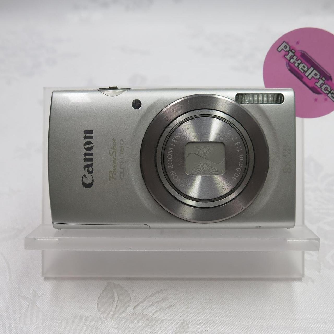 Canon Powershot ELPH 180 ♡𝘾𝙤𝙢𝙚𝙨 𝙬𝙞𝙩𝙝♡ ❥ Camera ❥ Battery ❥ SD card ❥ Charger ❥ SD card reader (if you purchase let me know if you need lightning or usb-c) ❥ Regular hand strap ❥ Beaded hand strap ❥ Case ♡ This cam has been tested extensively to make sure that everything is functional!! We can assure you that every feature has been tested and works perfectly!! ♡ 𐙚 Our shipping days are Tuesday and Thursdays so you should receive your camera 2-7 days after! #DigitalCamera #DigiCam #Camera #Canon #Powershot