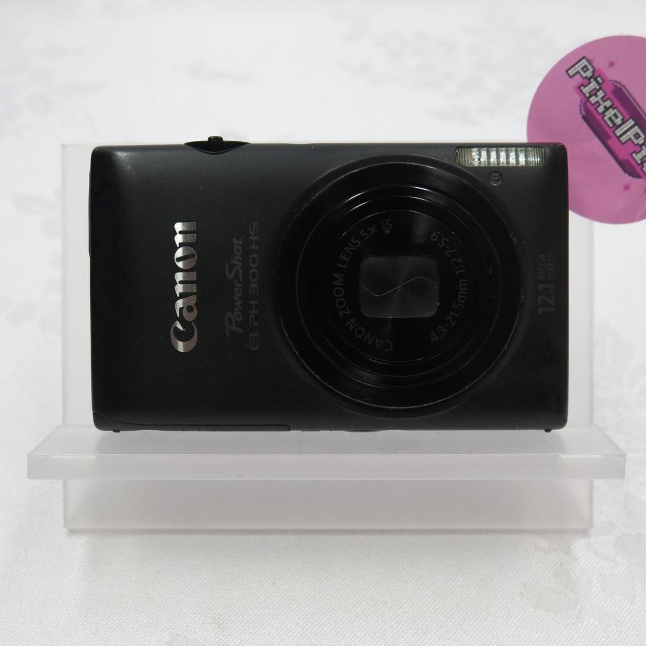 Canon Powershot ELPH 300HS ♡𝘾𝙤𝙢𝙚𝙨 𝙬𝙞𝙩𝙝♡ ❥ Camera ❥ Battery ❥ SD card ❥ Charger ❥ SD card reader (if you purchase let me know if you need lightning or usb-c) ❥ Regular hand strap ❥ Beaded hand strap ♡ This cam has been tested extensively to make sure that everything is functional!! We can assure you that every feature has been tested and works perfectly!! ♡ 𐙚 Our shipping days are Tuesday and Thursdays so you should receive your camera 2-7 days after! #DigitalCamera #DigiCam #Camera #Canon #Powershot